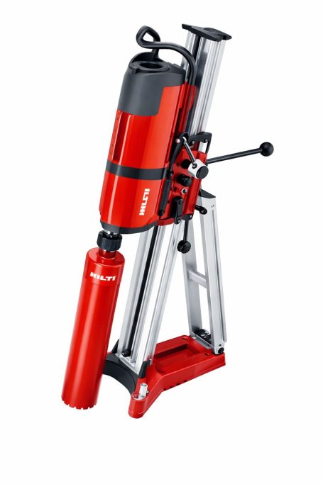 Perforadora eléctrica de núcleo con soporte, color rojo y detalles en plateado.